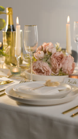 Vertical-Video-Close-Up-Of-Vertical-Video-Of-Table-Set-For-Meal-At-Wedding-Reception-With-Place-Card-For-Bride-2